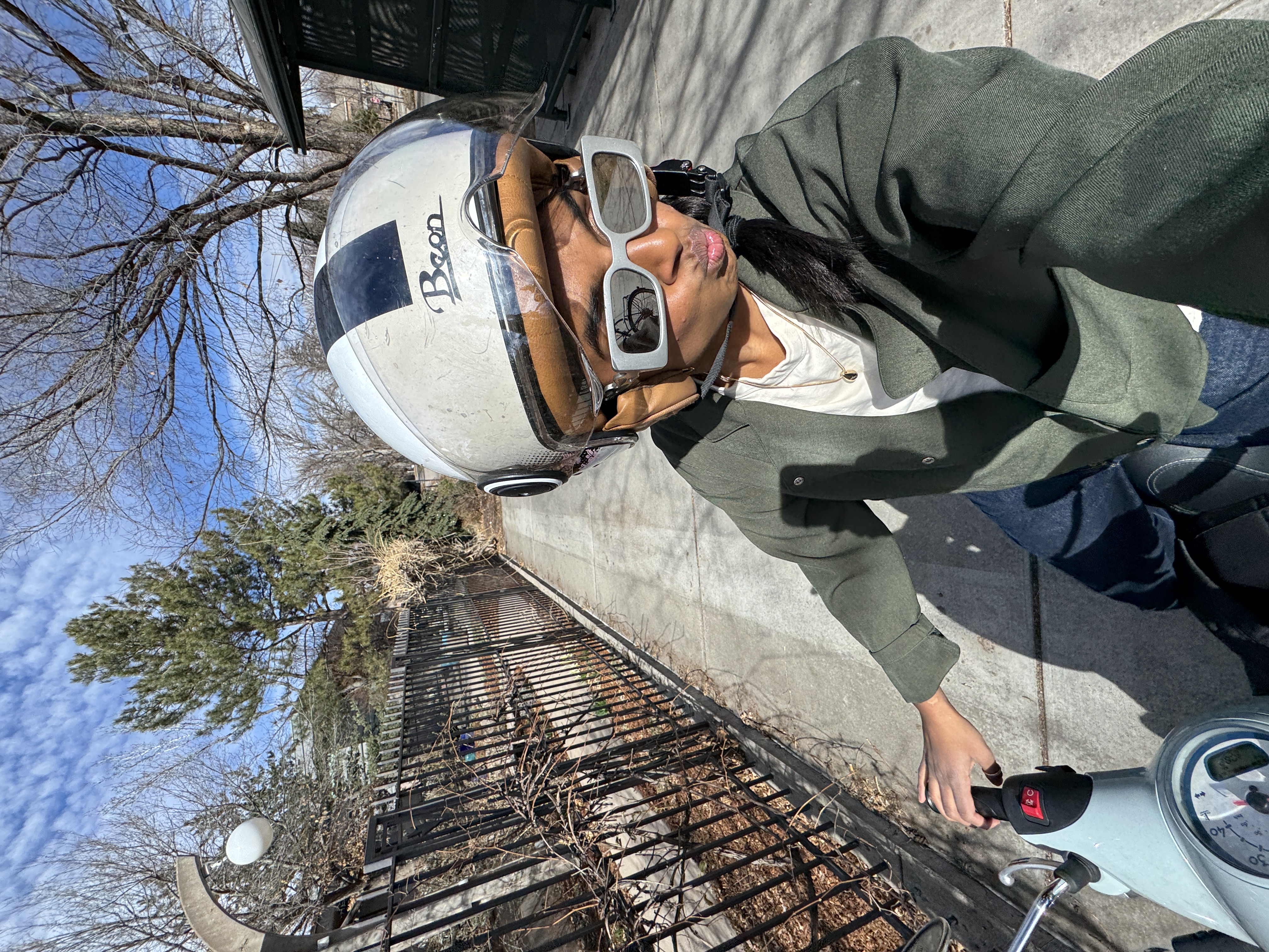 Neha on moped